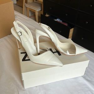 SCHUTZ Emma clear sling backs